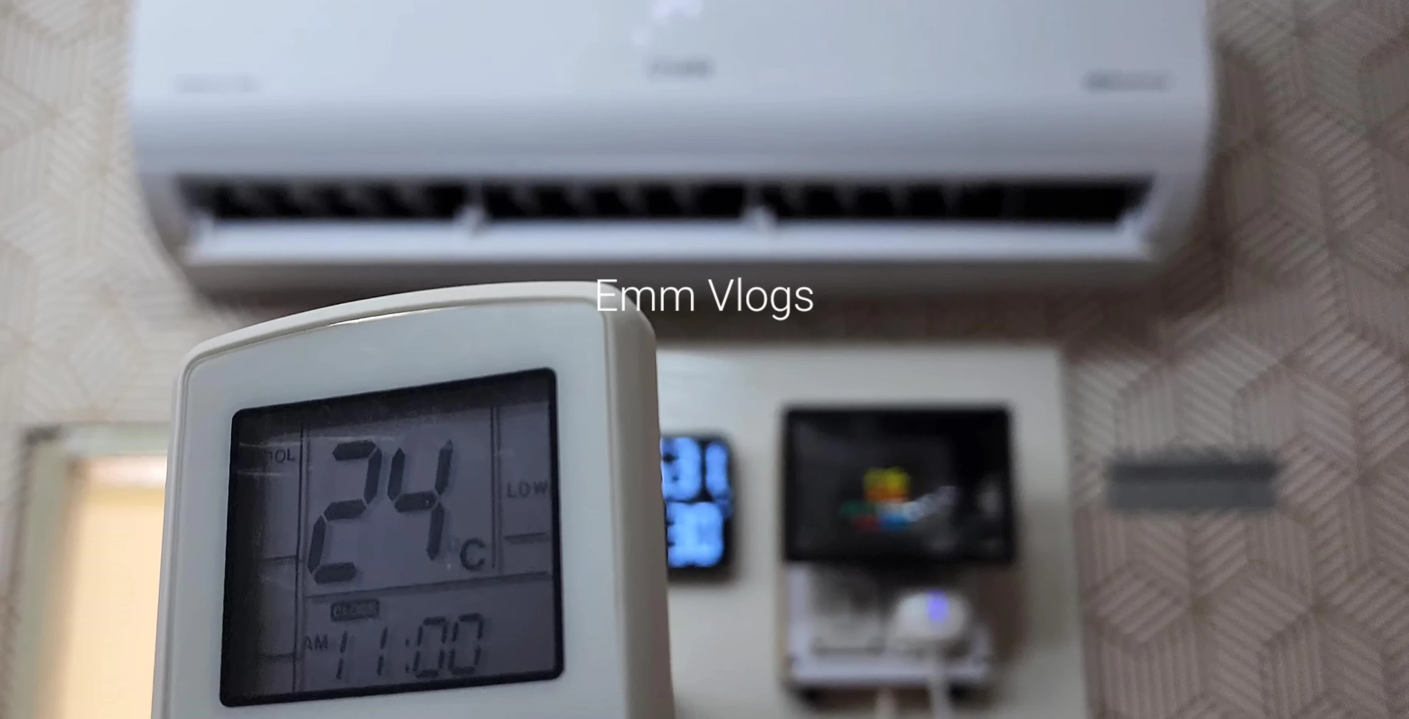 Remote control showing AC settings.