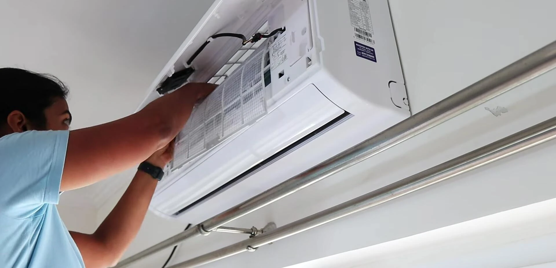 Close-up shot of the indoor unit showcasing its design and ease of filter access.