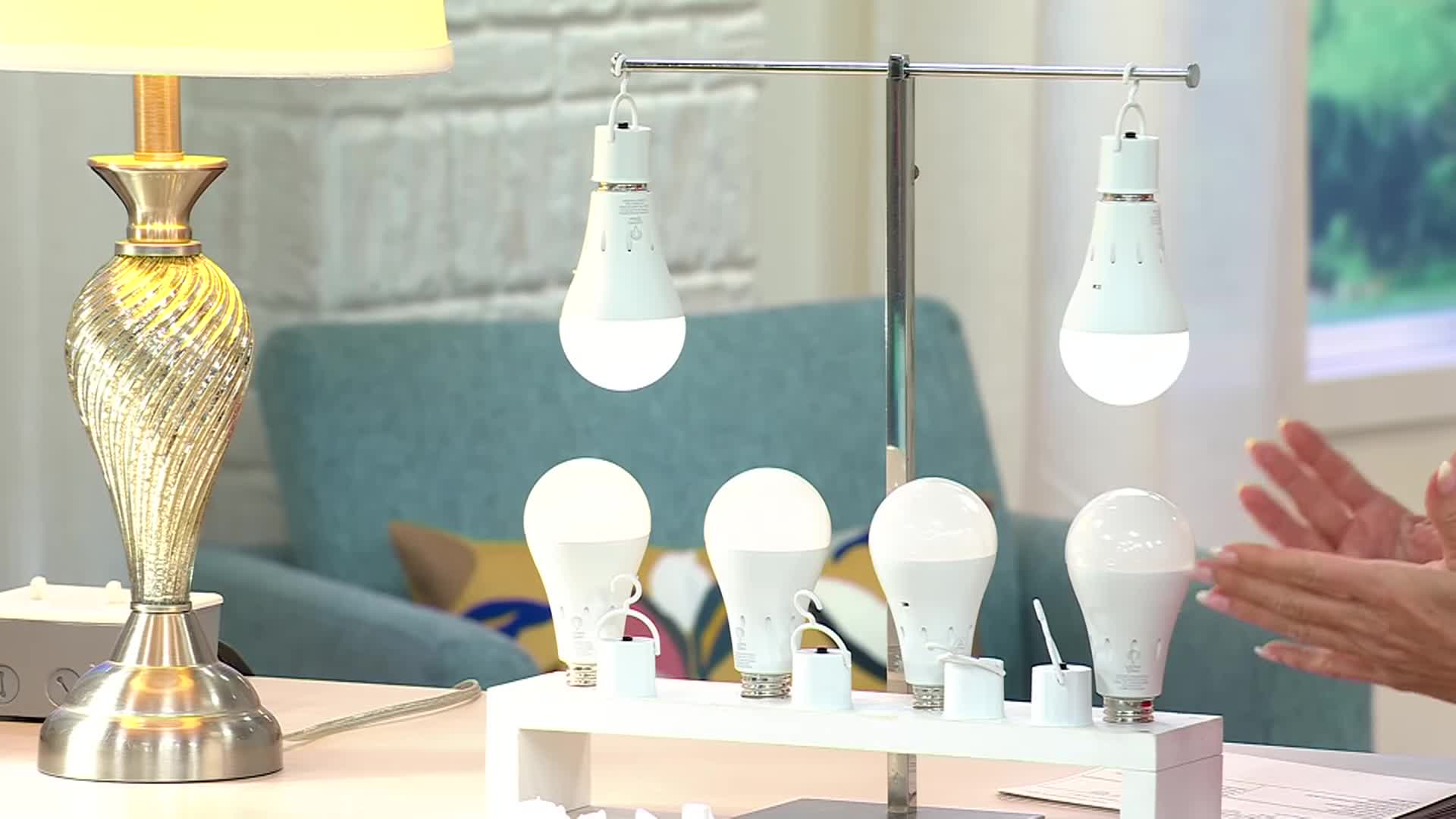 Image showing the packaging and contents of the Living Glow bulb set.