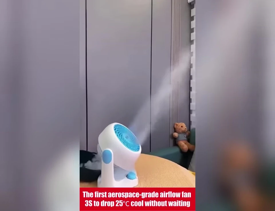 Demonstration of the fan's adjustable head and oscillation features.