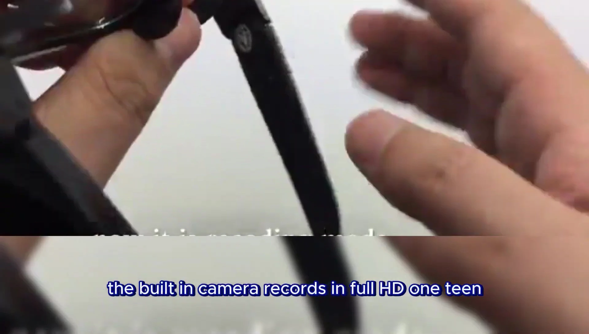 Close-up of the glasses highlighting the hidden camera.