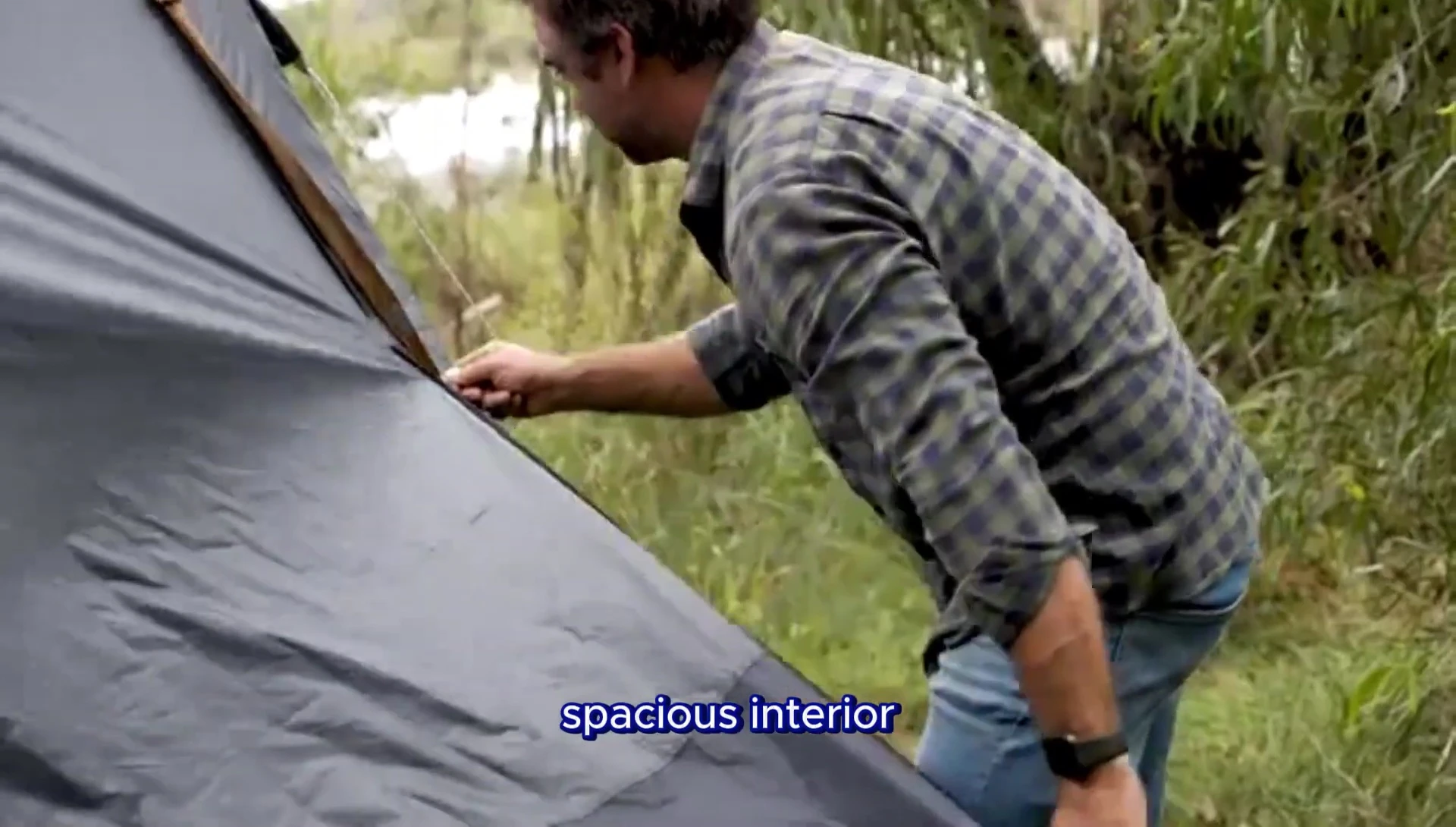 Interior shot of the OZ Trail Blockout Tent, highlighting its spaciousness.