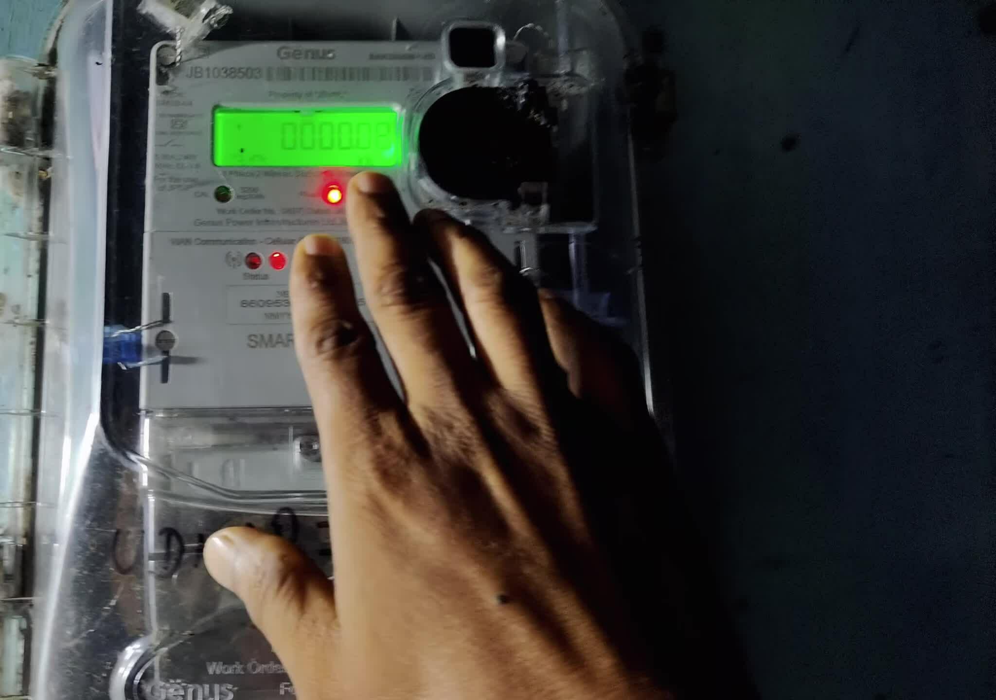 Close-up of a smart meter display showing energy consumption