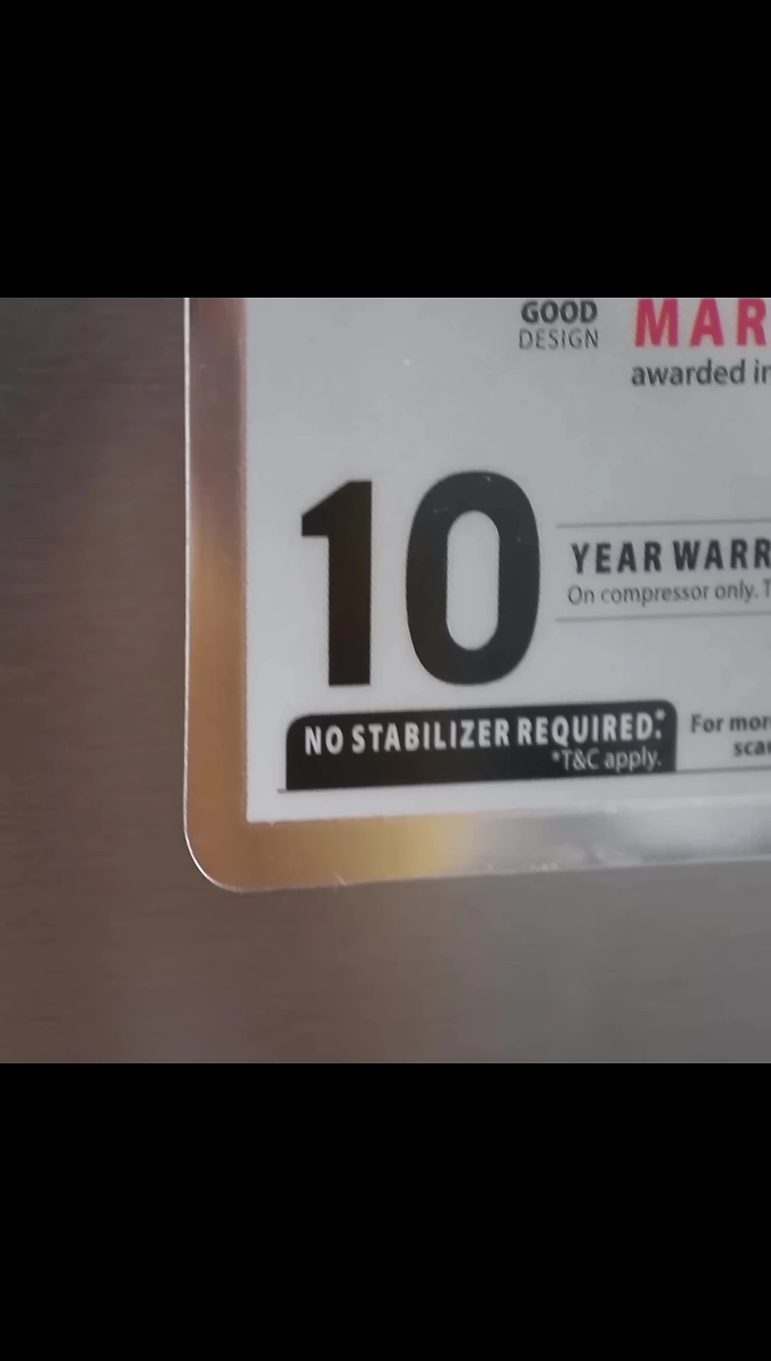 A shot of the refrigerator highlighting the 10-year warranty on the compressor.