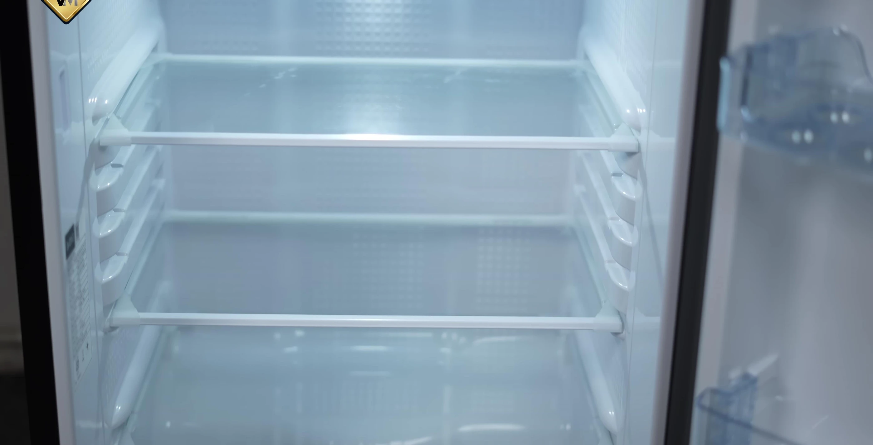 Interior shot showcasing the white plastic shelves and build quality
