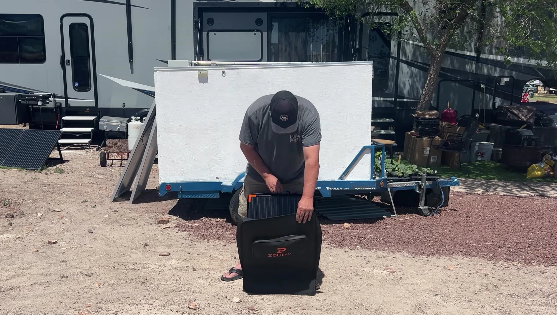 The contents of the ZoupW 200W solar suitcase laid out.
