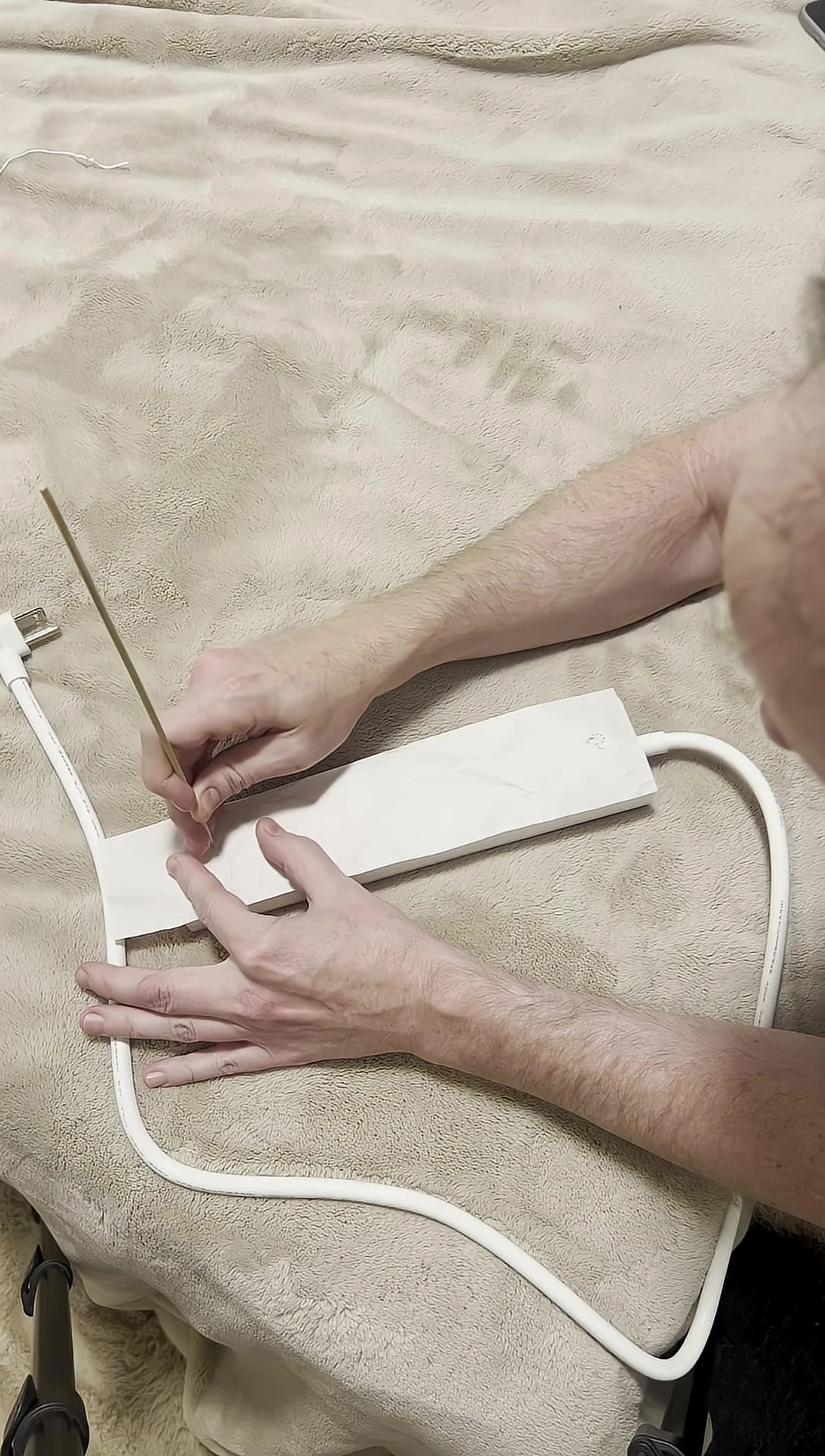 Demonstration of creating a wall mounting template